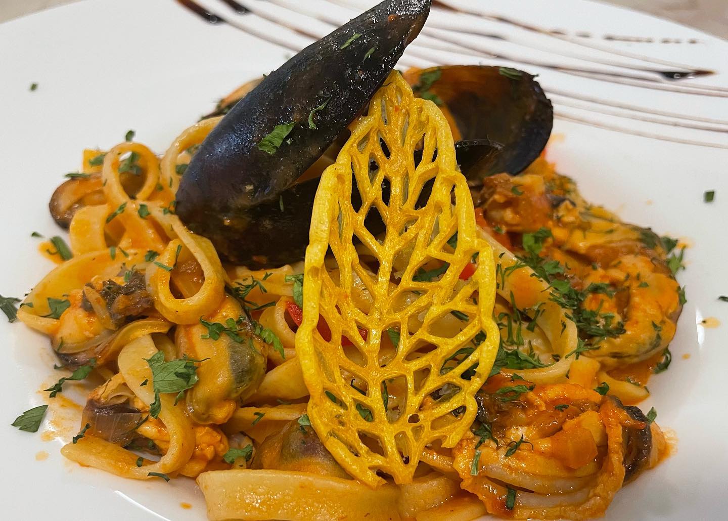 Preparat cu paste și fructe de mare